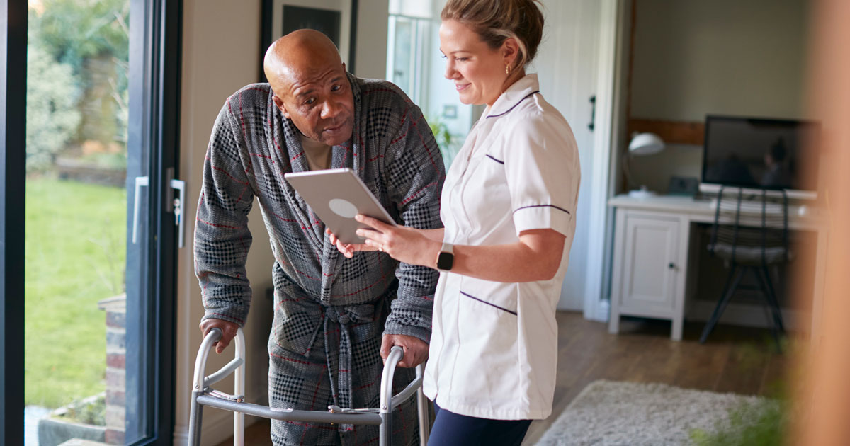 Senior Man With Female Nurse