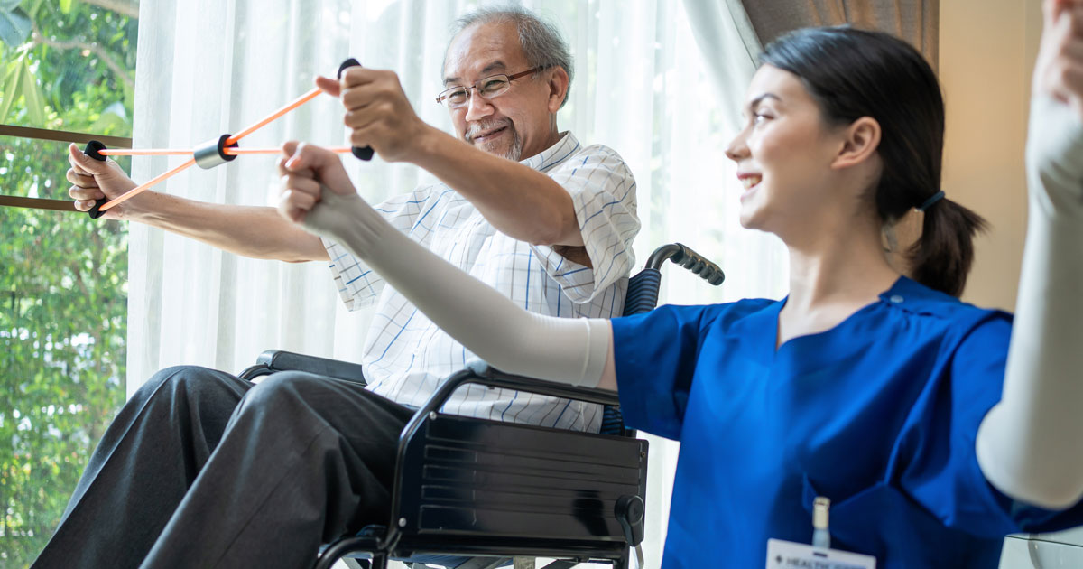 Elderly Asian Man Doing Physical Therapy