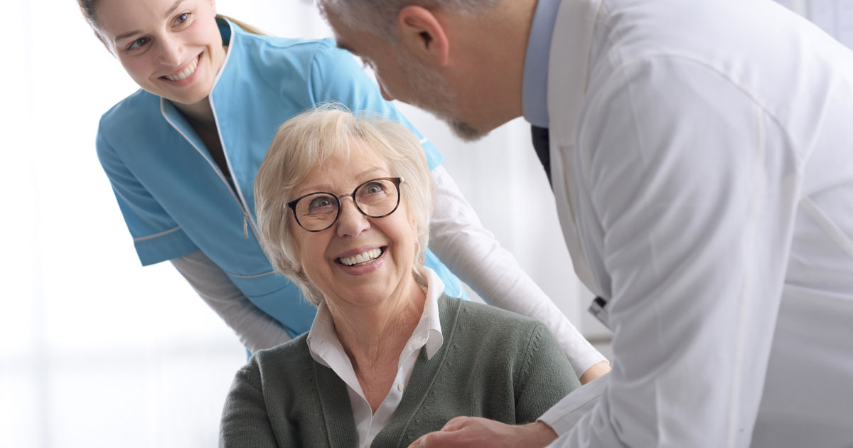 Elderly Woman Shaking Doctor's Hand