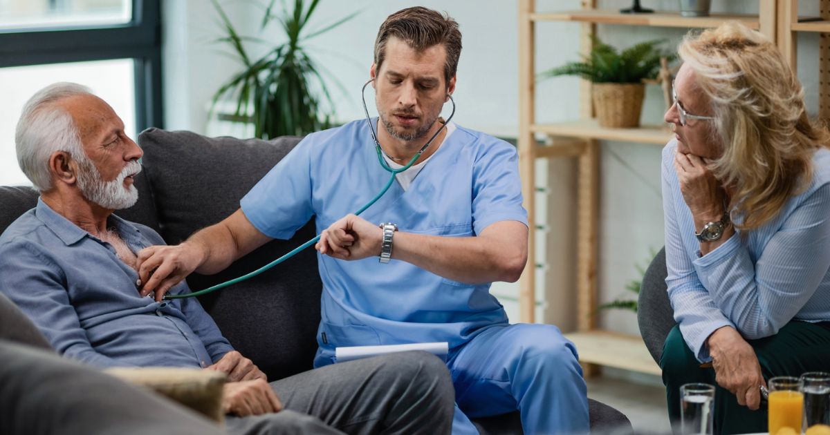 Healthcare Worker Listening to Heartbeat