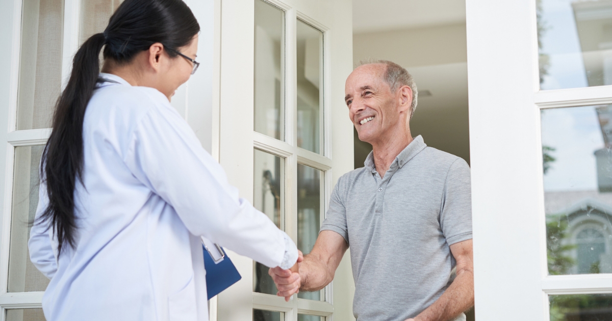 Man Shaking Caregiver's Hand