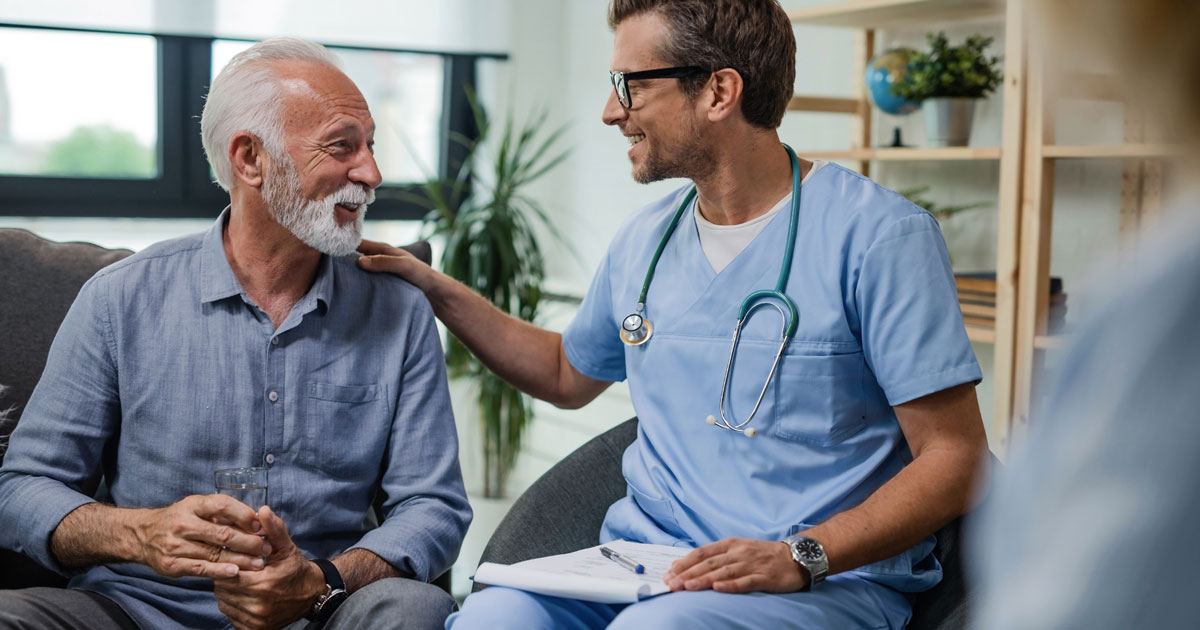 Male Doctor and Elderly Patient