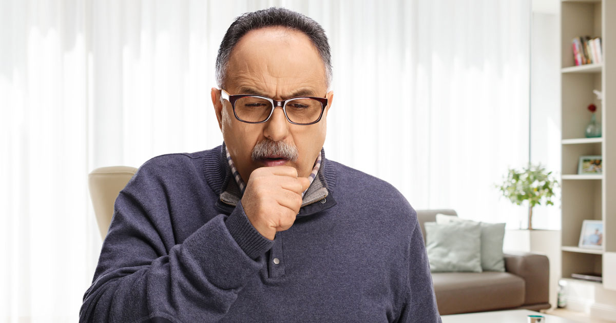 Man Coughing COPD Symptoms