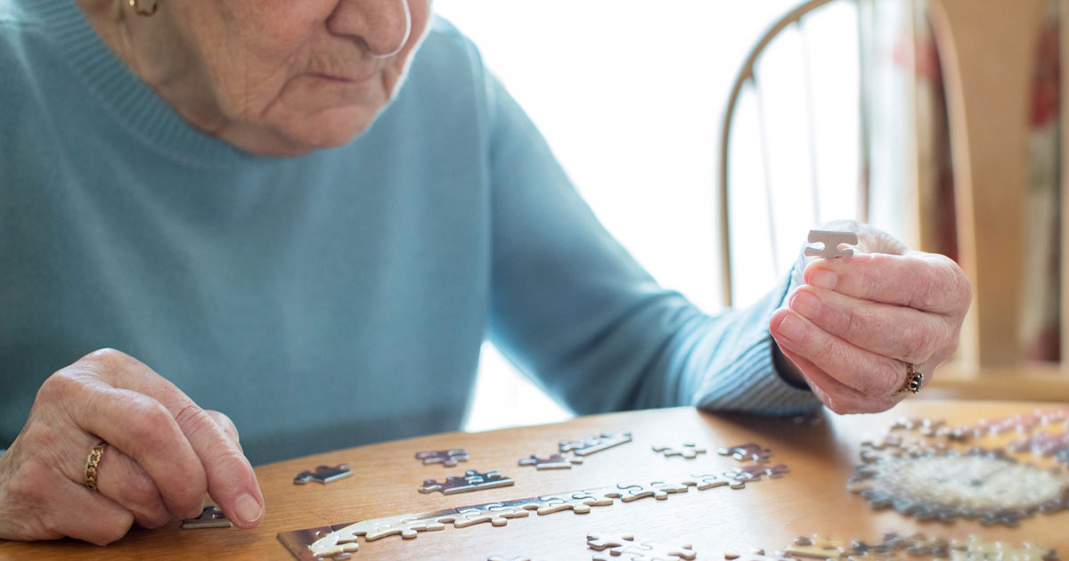 Senior Woman Doing Puzzle