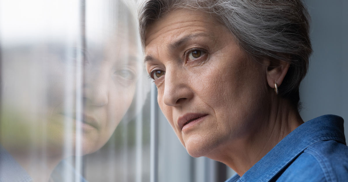 Woman Staring Out Window